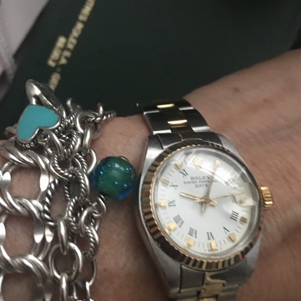 Rolex Women's Real 18K Gold Watch on stainless w/authenticity appraisal letter.